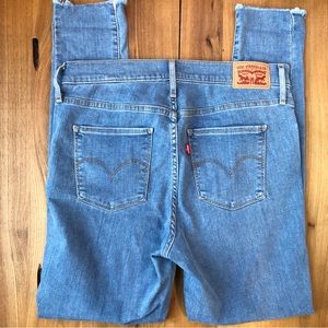 Levi's 720 High Rise Super Skinny Medium Wash Distressed Blue Jean